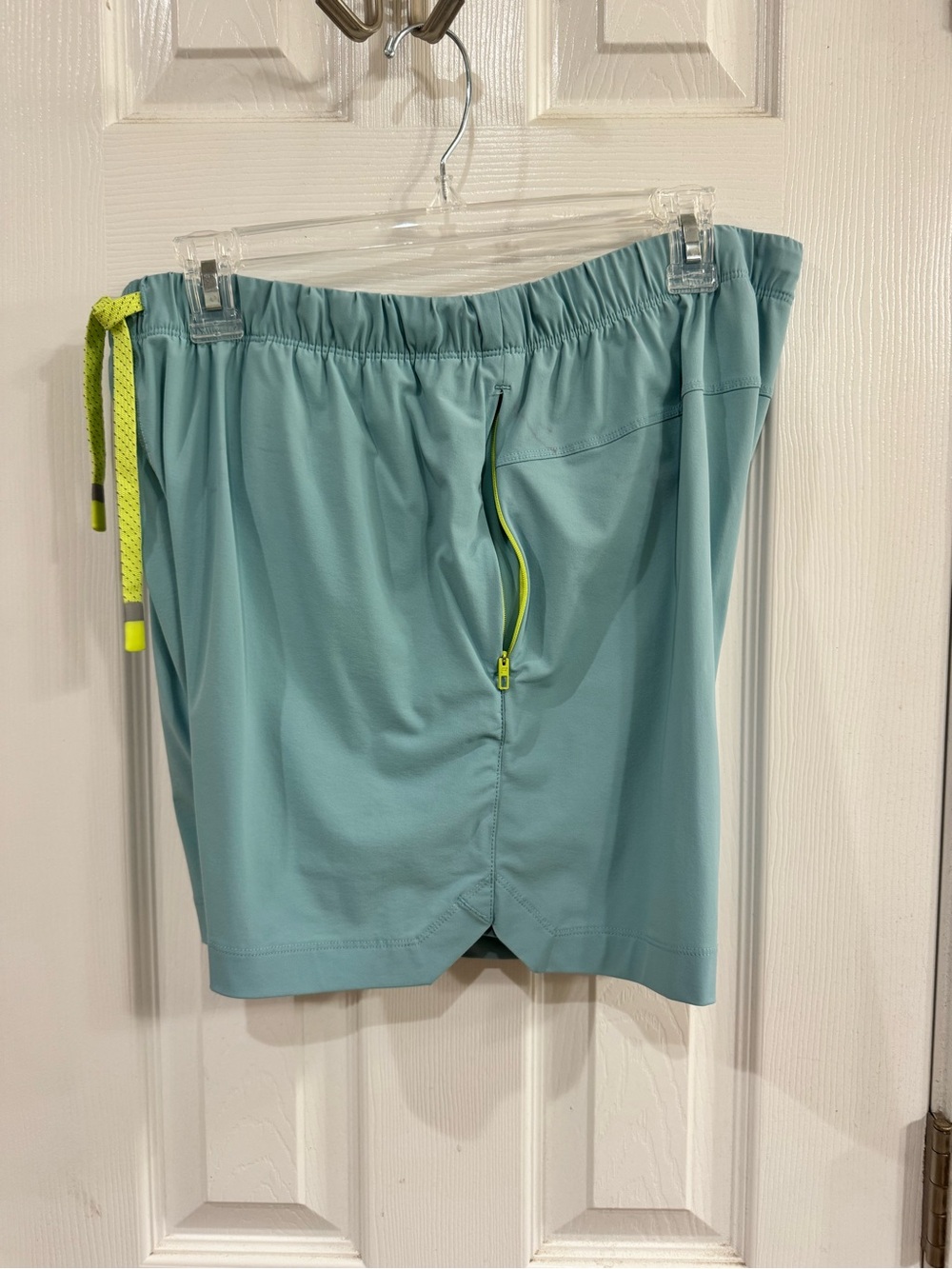Fabletics Light Teal Athletic Shorts with Neon Yellow Accents - Picture 5 of 9